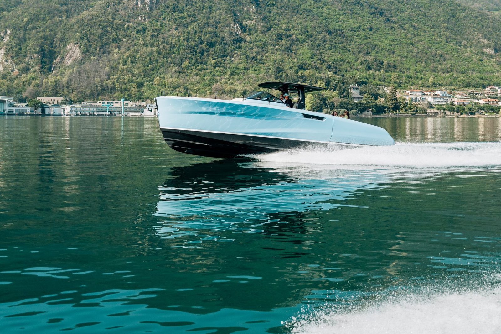 ASTOR 36 cruising with mountains behind